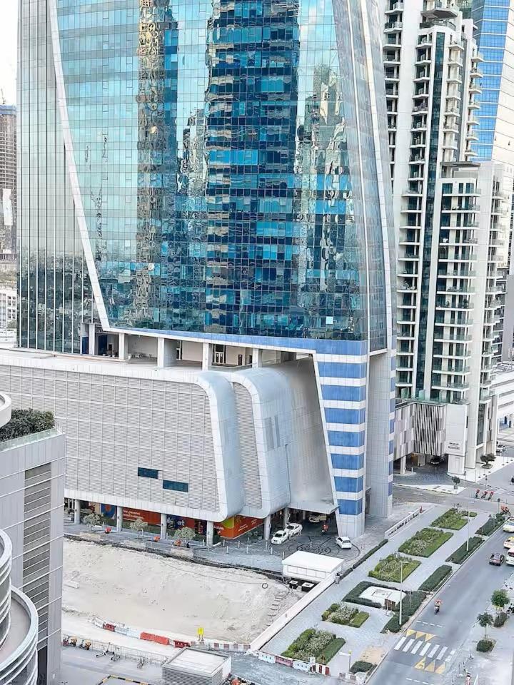 Apartment Canal Luxe Burj 1br Sleeps 4 With Pool And Gym